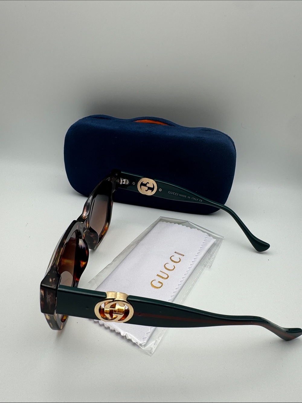 Gucci Tortoiseshell Frame Sunglasses with Dark Green Temples and Gold Logo